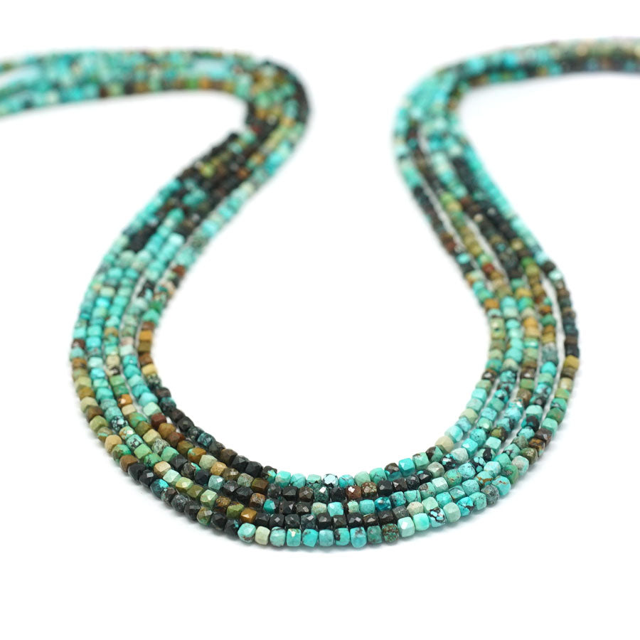 Turquoise Faceted, Banded 2mm Cube 15-16 Inch - Goody Beads