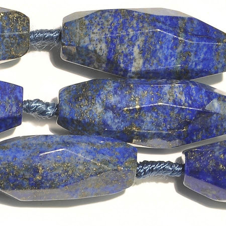 Lapis 10x25-12x34 Faceted Irregular Rice Bead