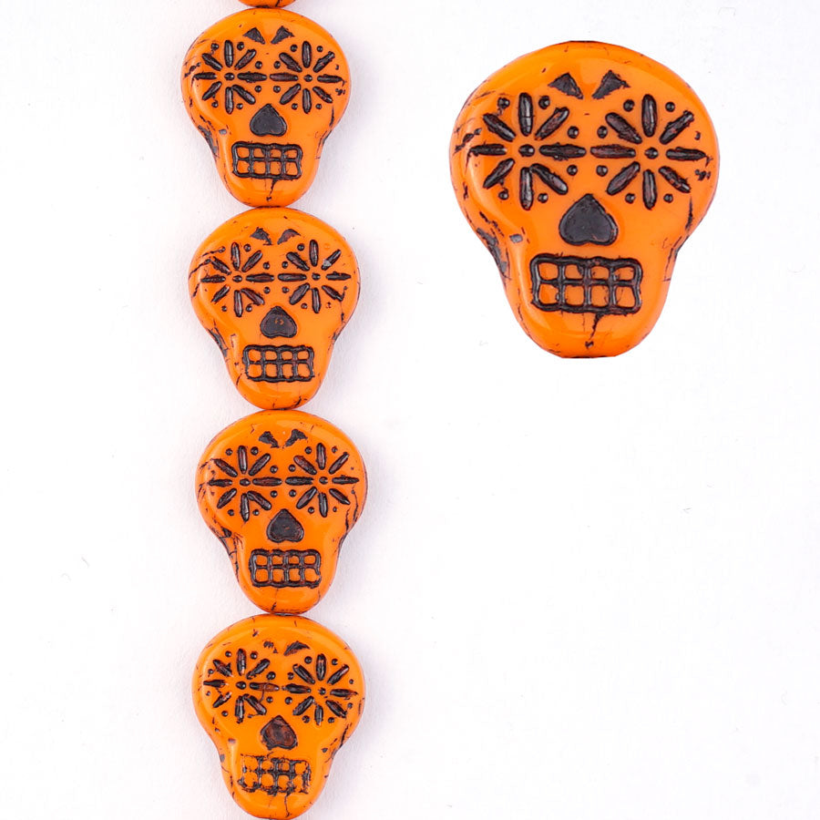 20mm Orange Opaque with Black Wash Sugar Skull Czech Glass Beads from Raven's Journey - Goody Beads